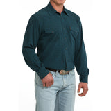 Side view of model in Cinch Men’s Teal Paisley Shirt.
