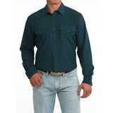 Model wearing the Cinch Men’s Teal Paisley Long Sleeve Shirt, showing the paisley print and classic Western snap closure fit.