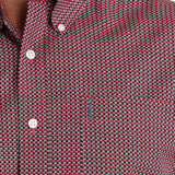 Close up view of the pink, black, and white geometric print. 