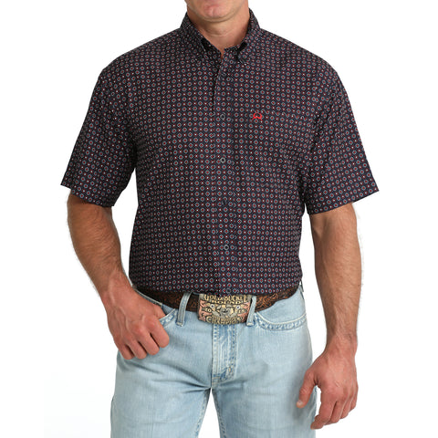 Model wearing the Cinch Navy Geo Print Short Sleeve Shirt, front view showing the navy geometric pattern, button‑down front, and classic Western fit.