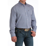 Male model wearing the Cinch ArenaFlex Lilac Geo Print Long Sleeve Shirt, side view.