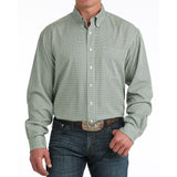 an wearing the Cinch Green Geo Print Long Sleeve Shirt, front view showing the geometric pattern, button‑down collar, and classic fit on a white background.
