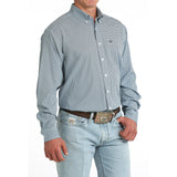 Side view of model in Men’s Cinch Light Blue Geo Print Shirt.