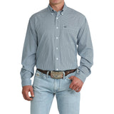 Model wearing the Men’s Cinch Light Blue Geo Print Long Sleeve Shirt, showing the geometric pattern and classic Western button‑down fit.