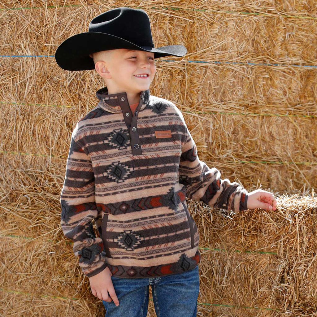 Front view of Cinch boys fleece showing bold Aztec print and relaxed fit