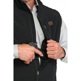 Close-up of concealed carry holster pocket inside Cinch black vest