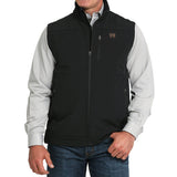 Front view of Cinch black concealed carry vest with zip closure and chest logo