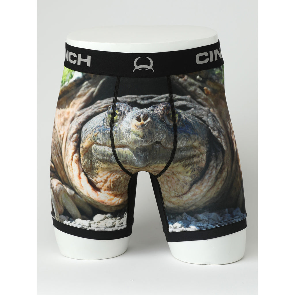 Cinch 6" Turtle Boxer Briefs shown from the front, featuring a moisture‑wicking athletic fit with a playful turtle graphic and supportive waistband.