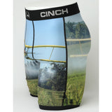 Side view of Cinch 9" Field Crop Duster Boxer Briefs showing length, supportive fit, and airplane artwork on a white background.
