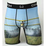 Front view of Cinch 9" Field Crop Duster Boxer Briefs featuring bold airplane graphics on a white background.