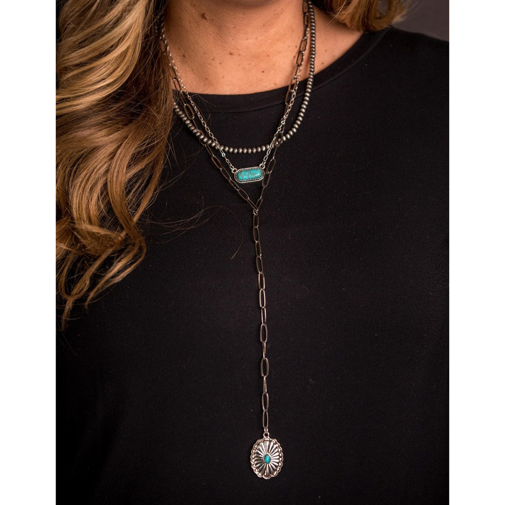 Necklace being worn on model