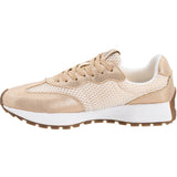 Full inside side view of gold sneakers. 
