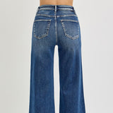 Top Backside view of the jeans, plain pockets with no stitching or detail.