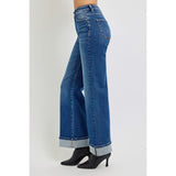 Side view of model in High Rise Wide Leg Cuff Jeans highlighting the wide leg and cuff detail.