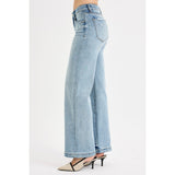 side view of light wash mid rise jeans