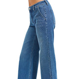Side view of jeans, bucket pockets in the front.