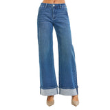 Front view of high waisted textured jean with a cuff on the bottom hem