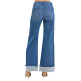 Back view of high waisted textured jean with a cuff on the bottom hem