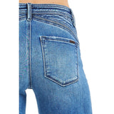 Close‑up of high-rise wide leg jeans with waist detail, showing the waistband design.