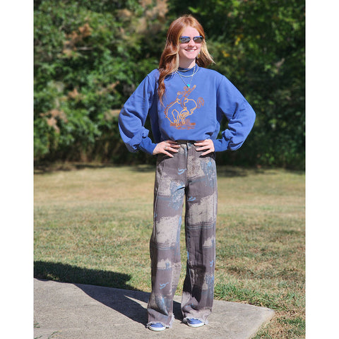 Ranch Scene design with wide leg and seem down the front, raw hem 
