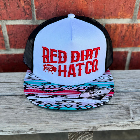 White and black cap with tribal brim and red red dirt logo.