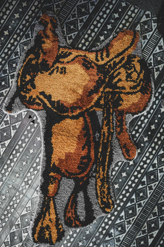 Brown Saddle Shaped Rug with Black Accent on Saddle - Grey edge