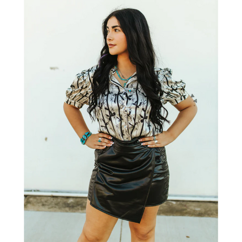 satin cream blouse with black ribbon print detail