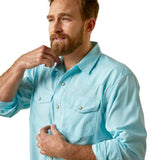 Western-style Ariat aquatic shirt showing pearl snap detail and pockets