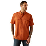 Man wearing an orange short-sleeve shirt on a white background