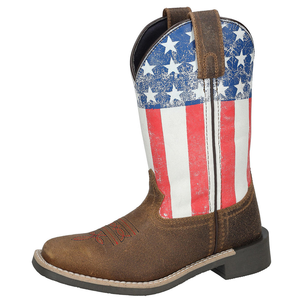 Side view of a single boot. It has a distressed American Flag on the shaft and the base it brown with black and red boot stitching. 