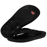 A pair of black sandals by HEYDUDE. One of the sandals is angled to where only its black outsole is visible.