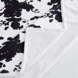 Elsa Black Cowhide Sherpa Throw