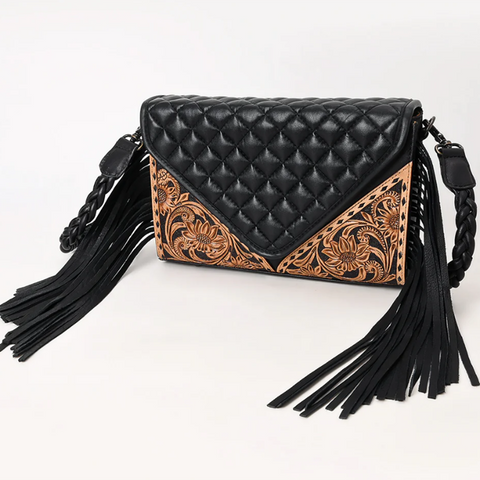 Black and tooled leather handbag with fringe . Braided leather strap