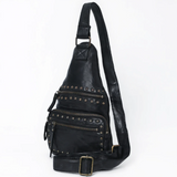 Soft and supple back leather sling crossbody with metal brads 