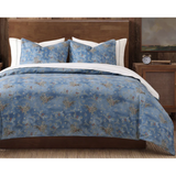 denim colored comforter with bronc rider and red stars . Comes with 2 pillow shams 