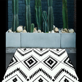 Aztec print outdoor rug that is reversable 6 x 9 Black & White