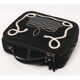 Black boot stitch pattern jewelry case. 
