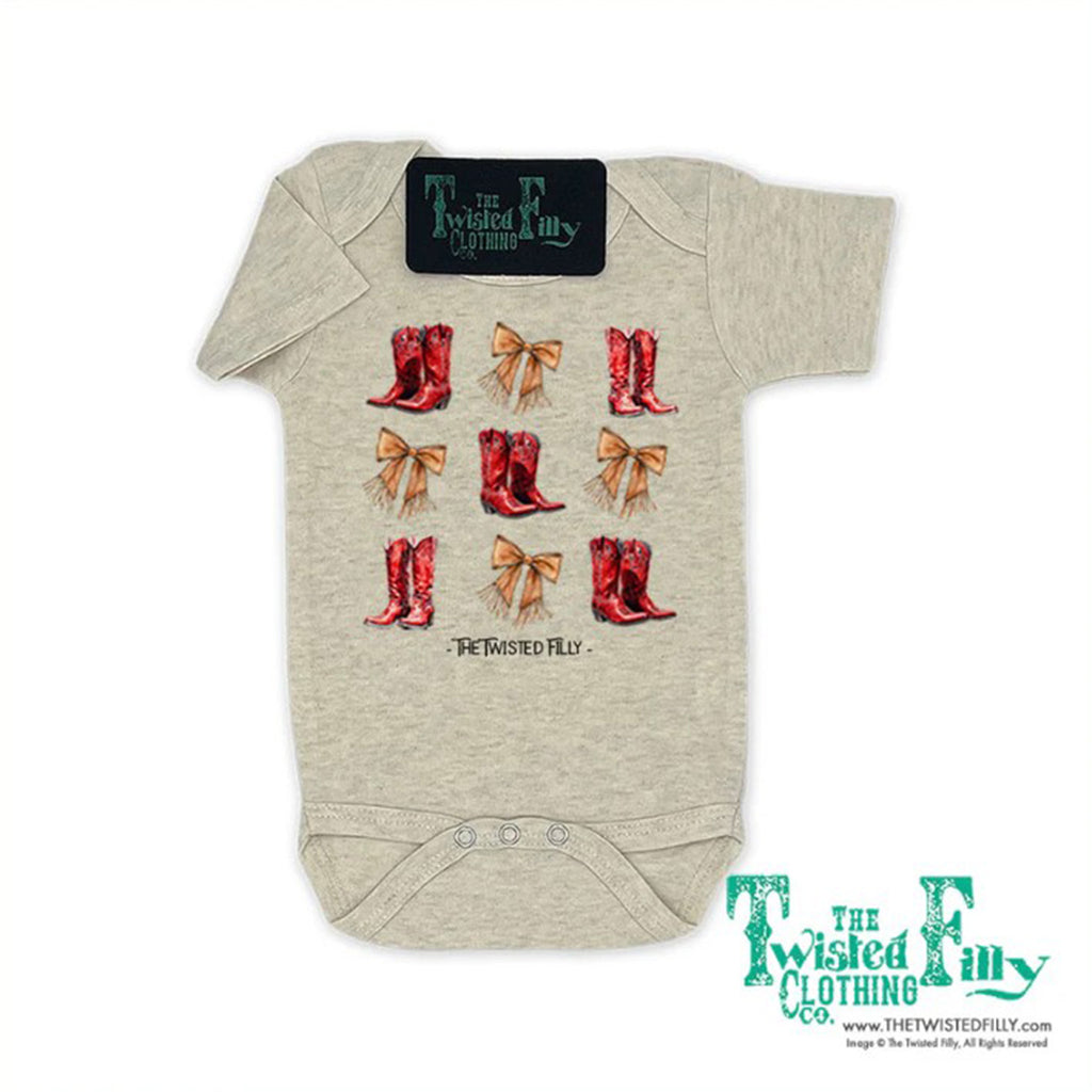 Oatmeal Colored Onesie with a Boots and Bows Graphic