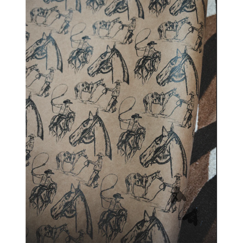 Patterned paper with illustrations of horses and riders on a textured background