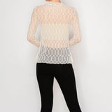 Woman wearing beige mesh long sleeve top layered back view