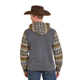 Back view of model wearing the Men’s Charcoal Color Block Aztec Print Hoodie, showing the color‑block design