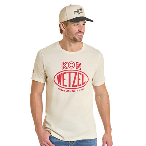 Model wearing the Koe Wetzel 1992 Tee facing forward, showing the bold 1992 graphic and relaxed unisex fit.
