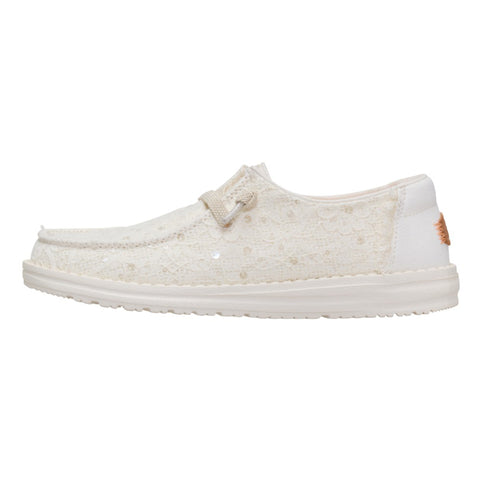Side view of the Hey Dude Wendy Sequin Lace Ivory Shoes showing the soft ivory upper, sequin lace detailing