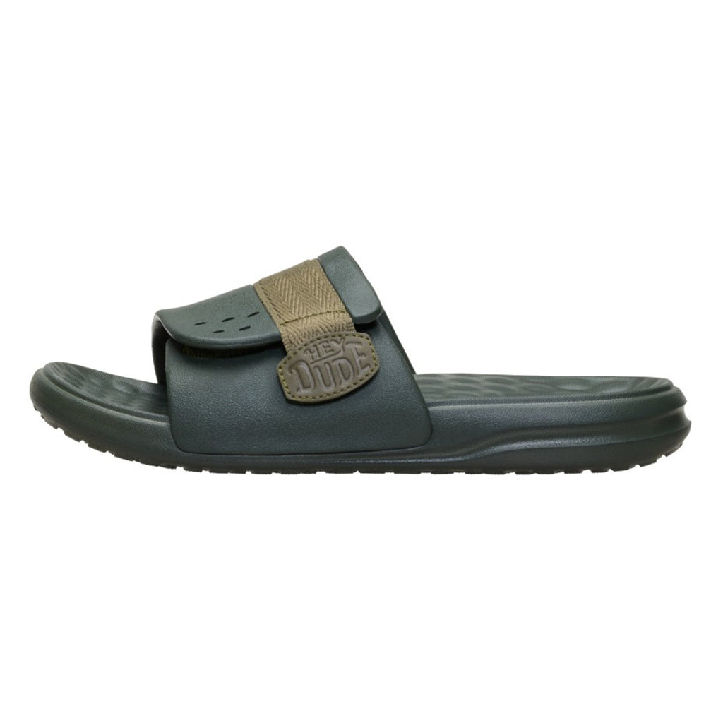 Side view of the Hey Dude Dark Green Wave ALT Slide showing the contoured footbed and lightweight sole.