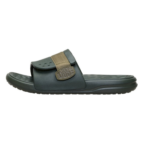 Side view of the Hey Dude Dark Green Wave ALT Slide showing the contoured footbed and lightweight sole.