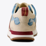 Back side view of single denim star ranch runner shoe. 
