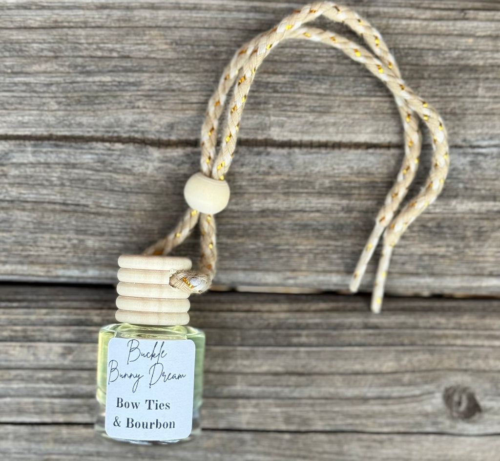 Small Bottle of fragrance on a rope to hang 