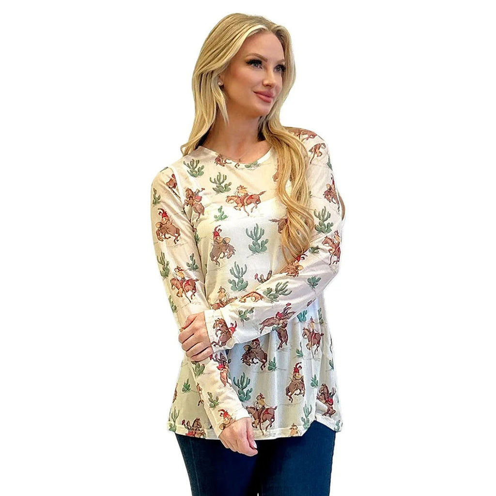 Cream colored mesh shirt with cacti and wild cowboy prints. 