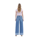 Back view of high rise cuffed blue jeans