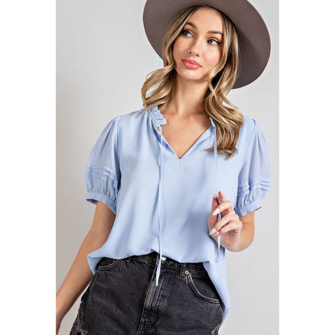Periwinkle Blouse with a Ruffled Mock Neck, Tie Closure and Puff Sleeves